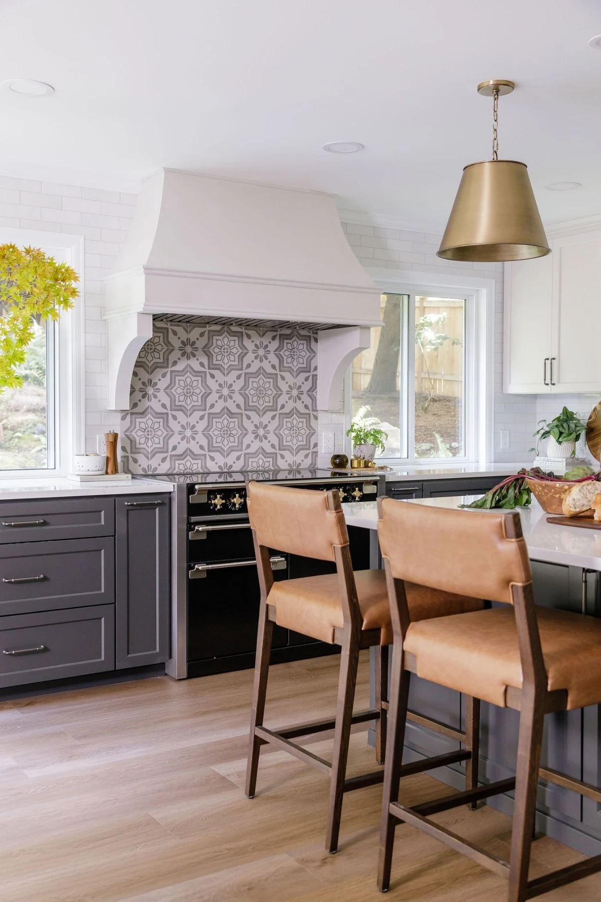 Dining nook with pale wood cabinetry and built-in counter