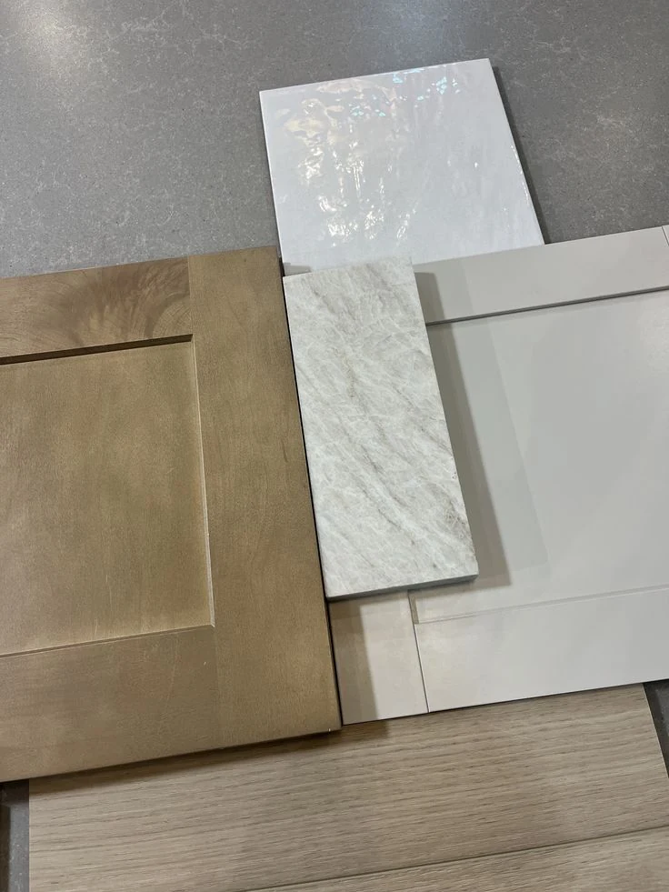 White shaker cabinet doors with light neutral sample finishes