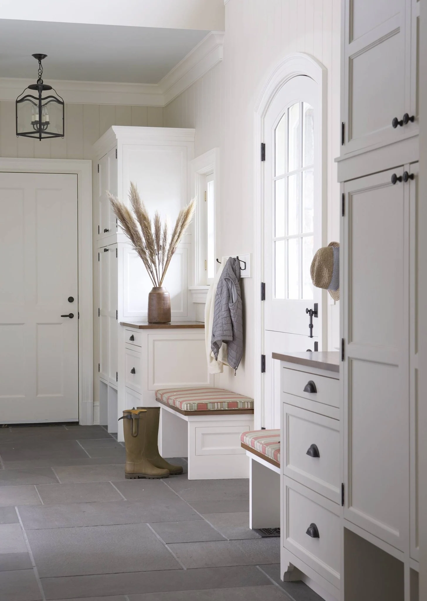 White utility room with shelving and countertop